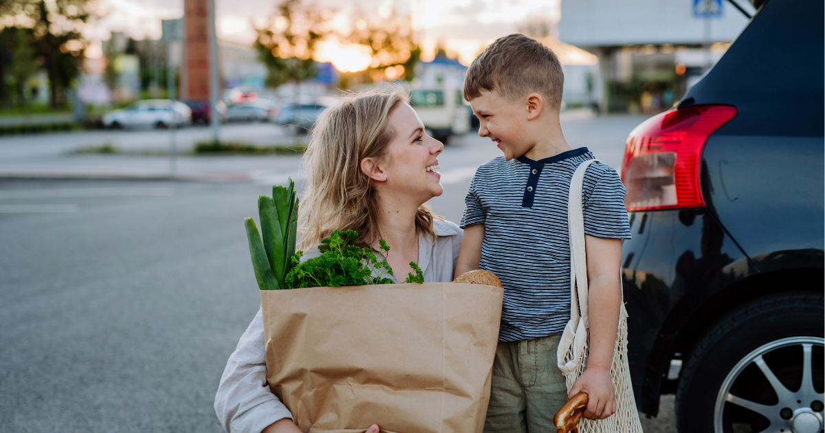 mom-with-son-carrying-groceries