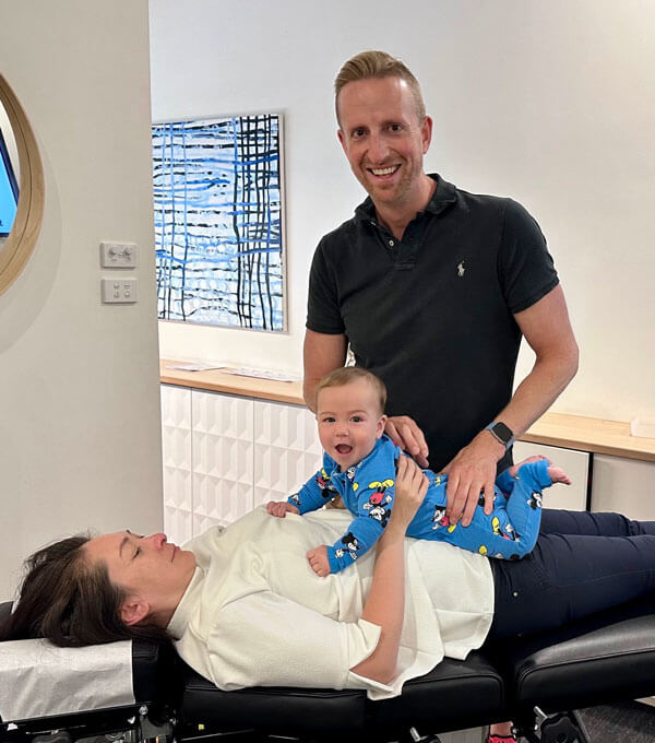 Doctor with Patient and Baby