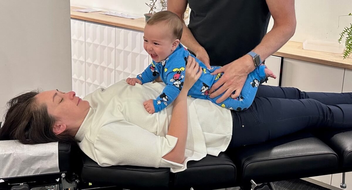 Young child receiving a chiropractic adjustment at Peak Potential Chiropractic