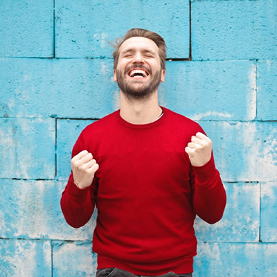 Very happy man wearing red shirt