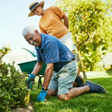 couple gardening outdoors
