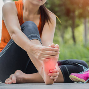 Shockwave wand on elbow, highlighting Peripheral Neuropathy services at Parkview Chiropractic, Chiropractor Oakdale MN.