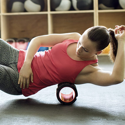 person on foam roller