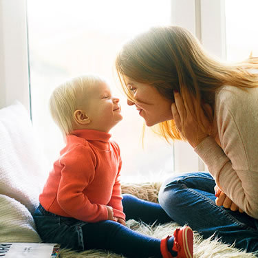 Mom and child face to face