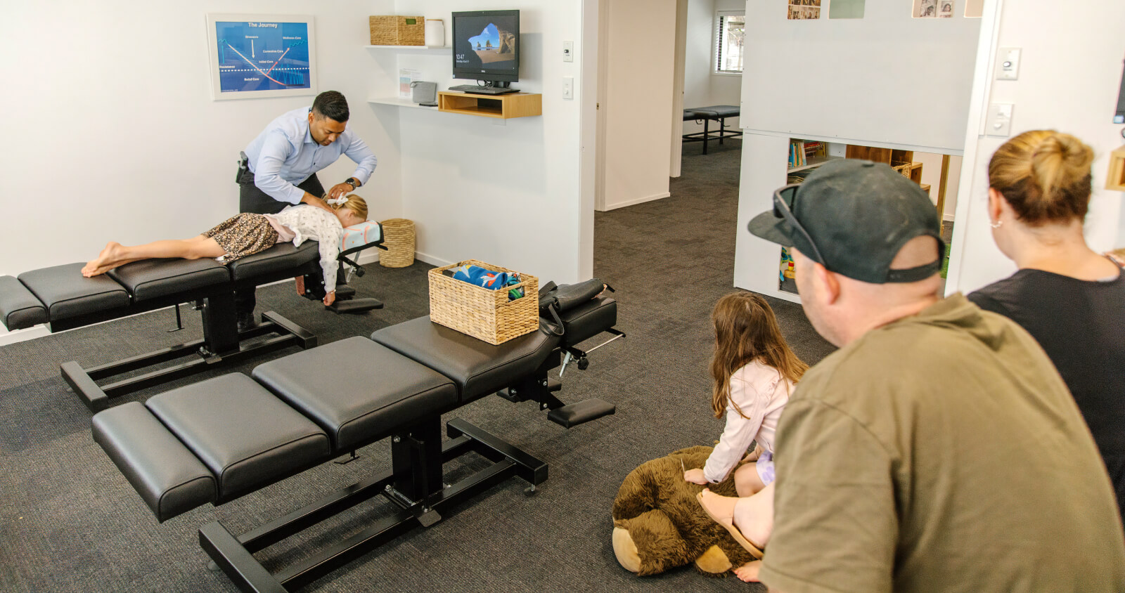 chiropractor adjusting kid 