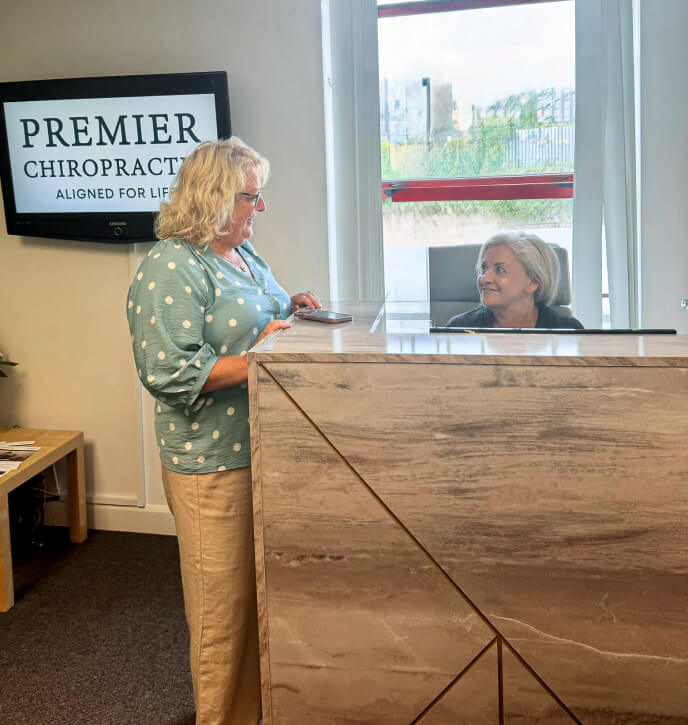 Patient at front desk