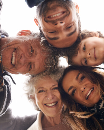 Group of smiling people in a huddle