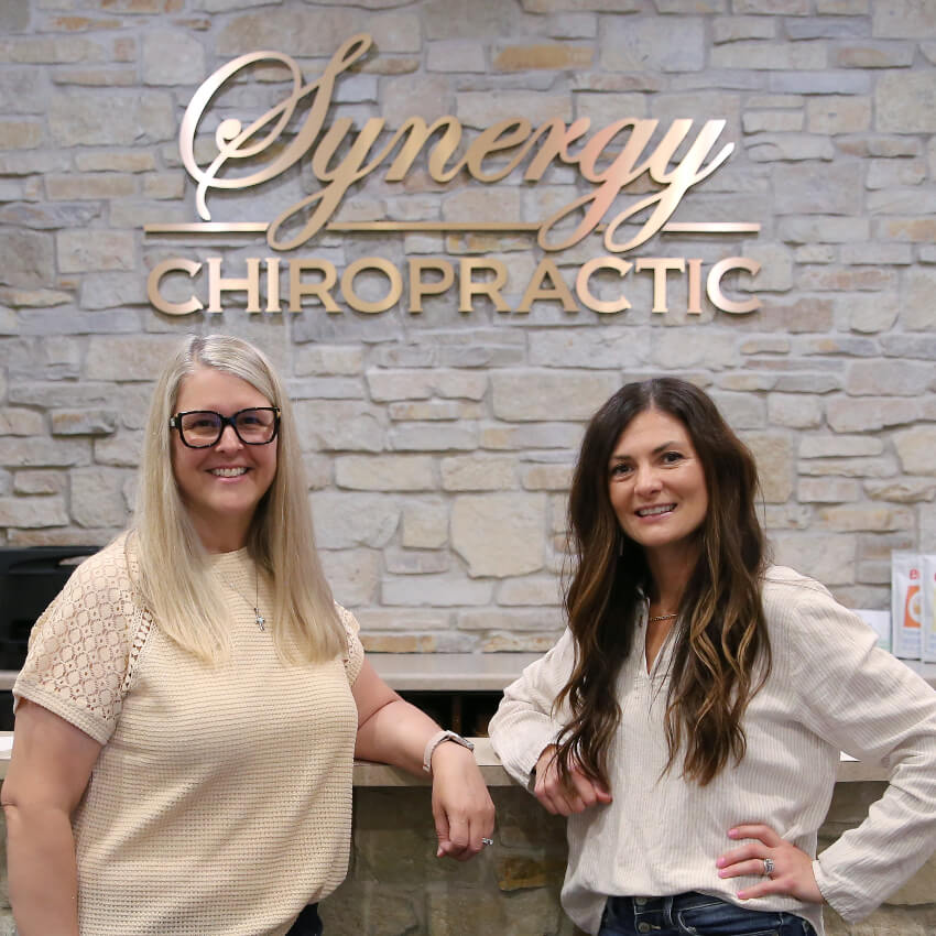 Synergy Chiropractic & Wellness Center team members at our front desk