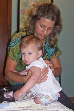 Doctor adjusting a baby