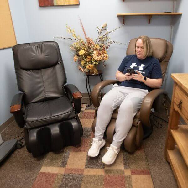 Total Care Chiropractic patient sitting in chair