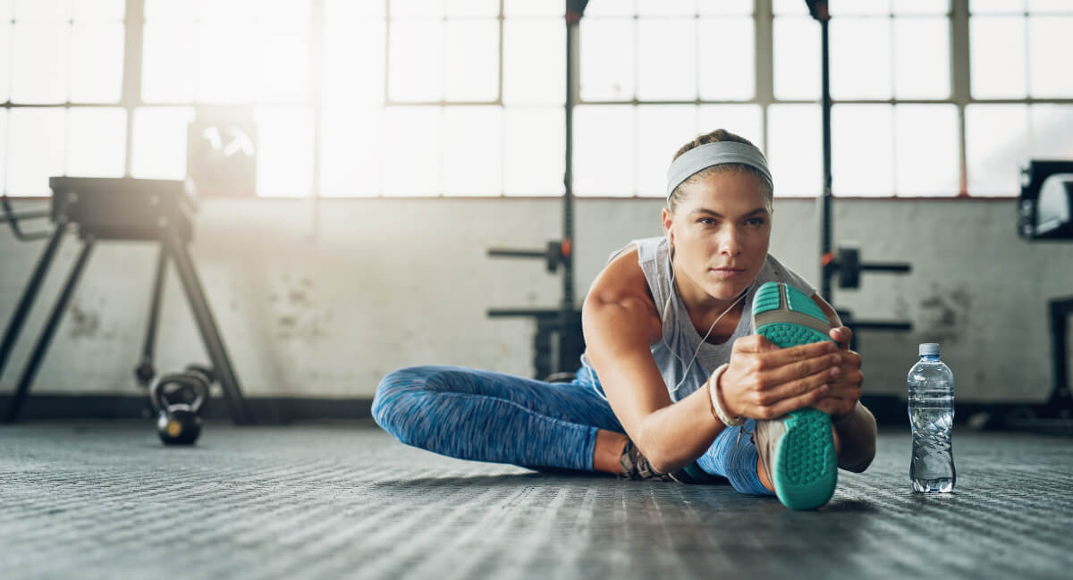 Female athlete stretching