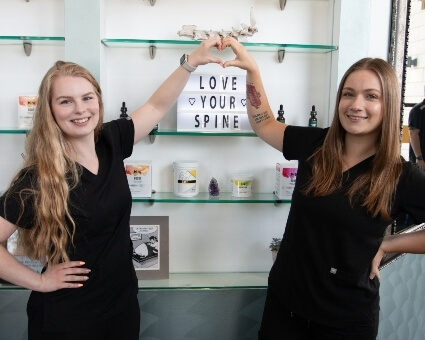 Holding paperdoll cutouts