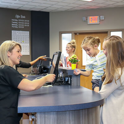 Staff greeting patients