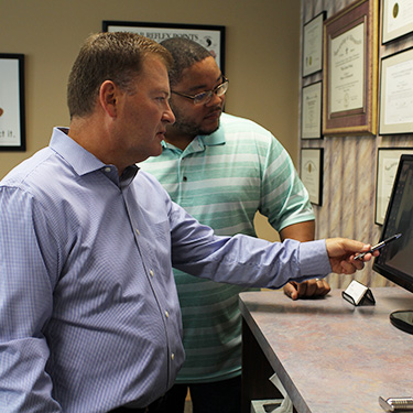 Dr. Stuckey reviewing xrays with patient