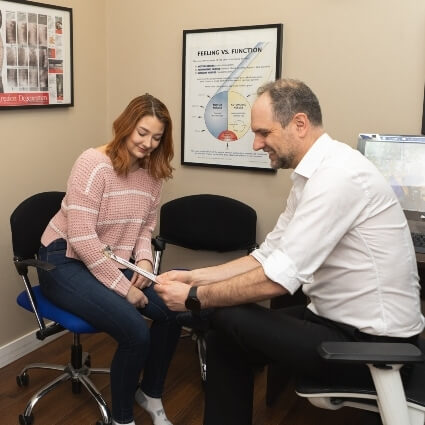 Dr Ryan showing patient results