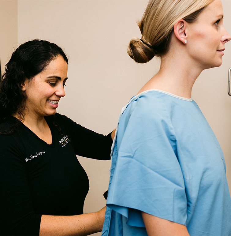 Examining patient's back