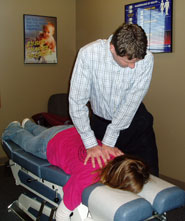 All ages can benefit from chiropractic care, as seen here, Dr. Jamie adjust a teenager.