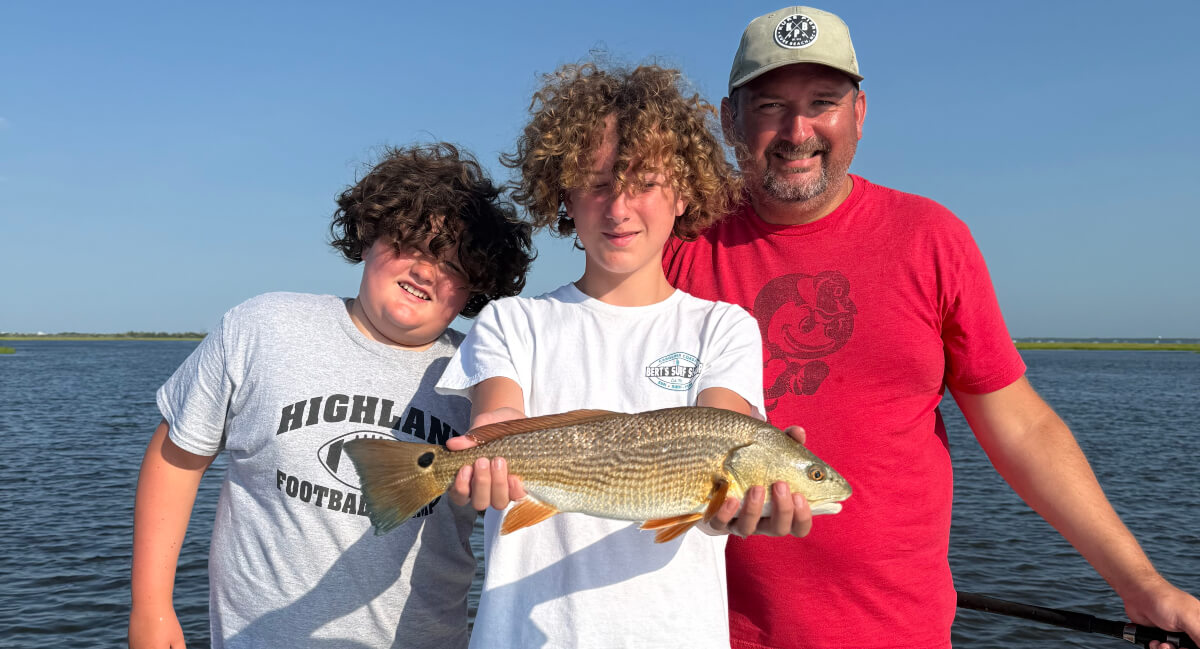 Dr. Marty Moore and his two sons