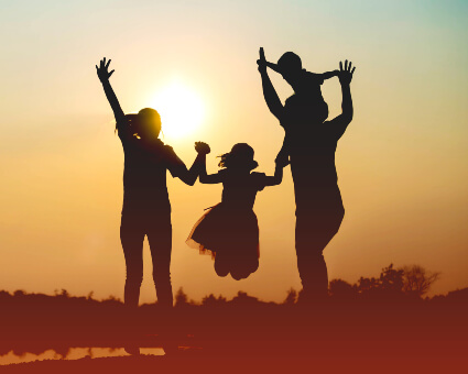 Family of four outdoors