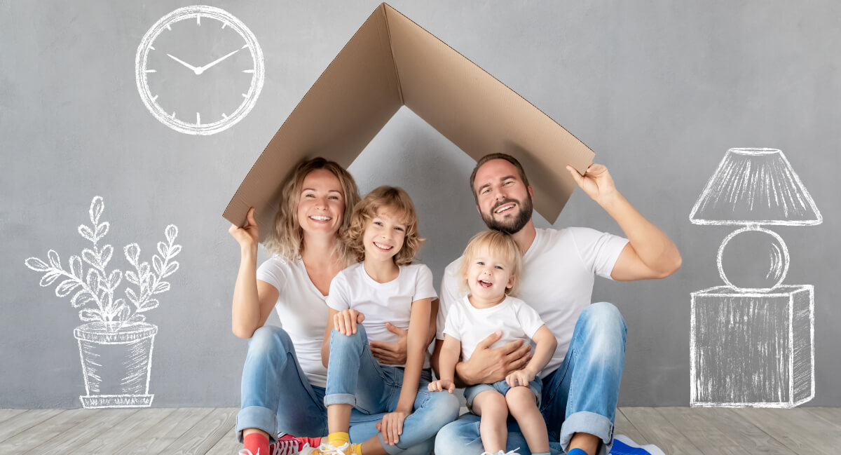 Family of four playing house