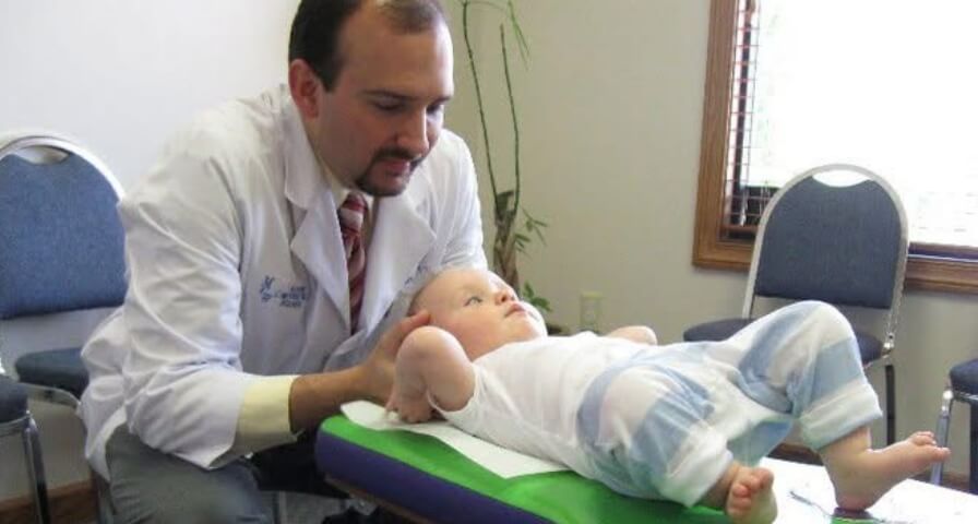 Wooster chiropractor adjusting a pediatric patient
