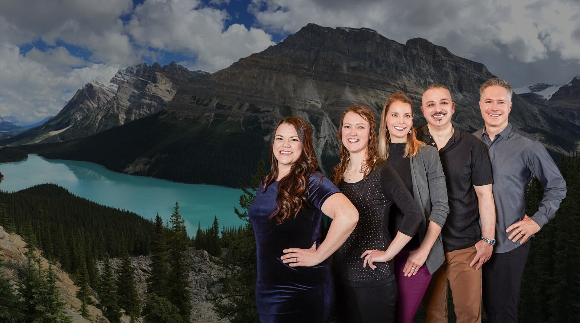 Our Beacon Hill Chiropractic and Massage team in front of a mountain photo