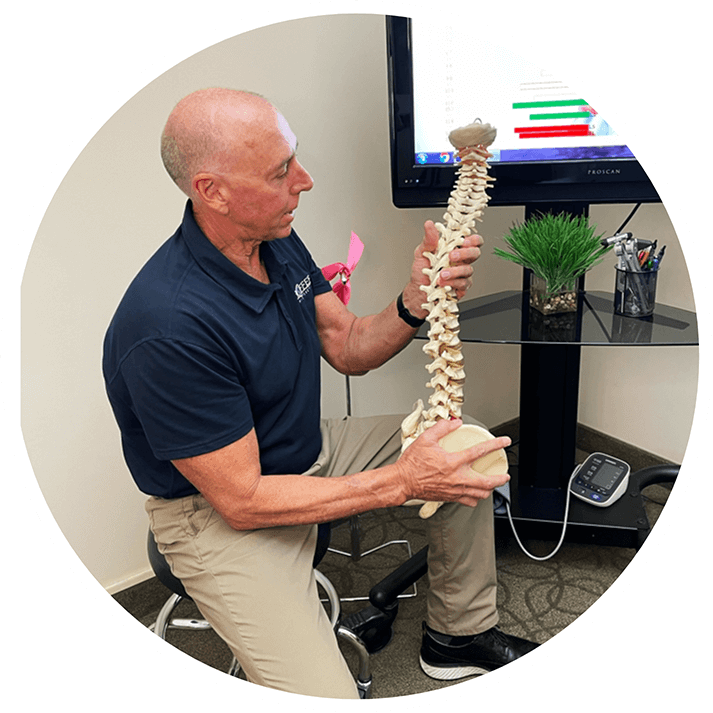 Dr. Scott Hoffer holding spine