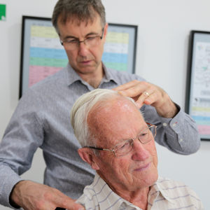 chiropractor-adjusting-man