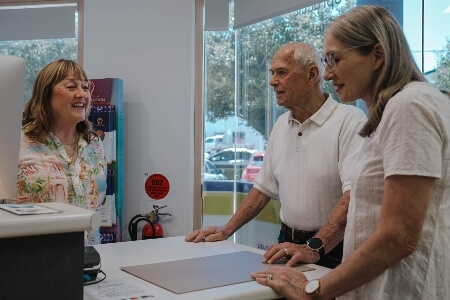 Patients checking in at front desk