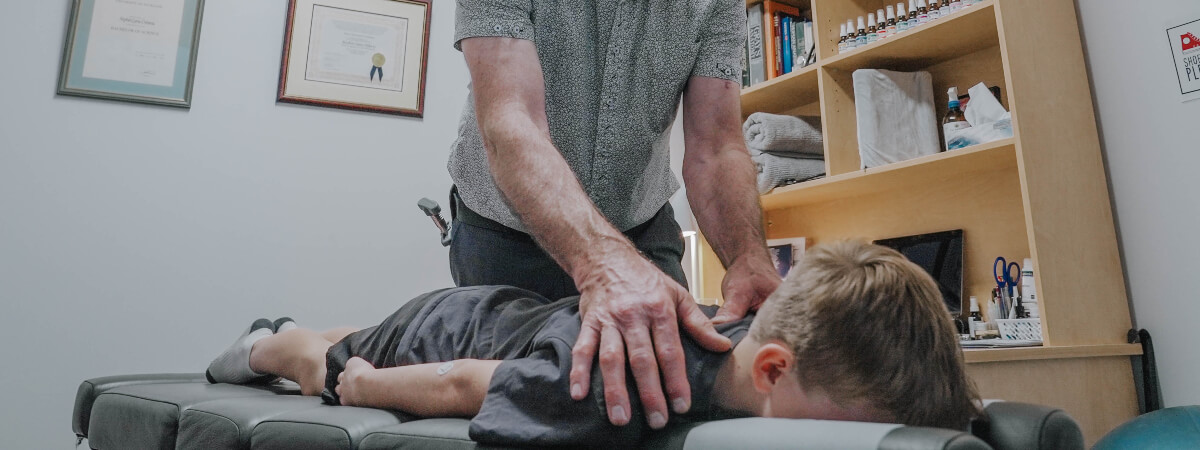 Toowoomba chiropractor adjusting a child