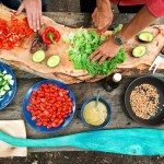 person-holding-sliced-vegetable-2284166