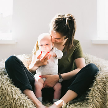 woman sitting with baby