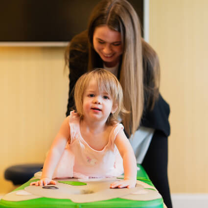child on adjusting table