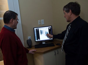 Dr. Dan Fonke explaining what was found in the X-ray. Dr. Dan Fonke explaining what was found in the X-ray.