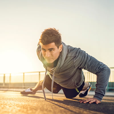 Athlete one hand push ups