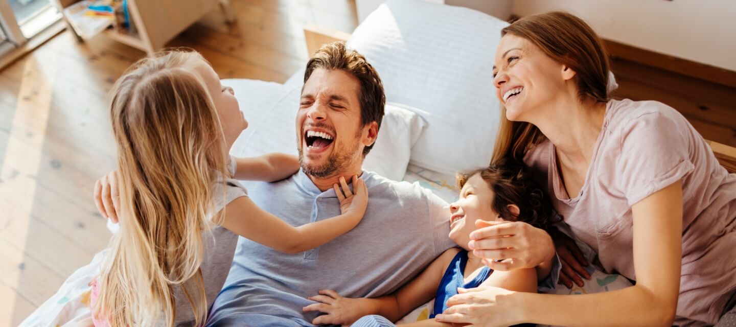 Family of Four laughing