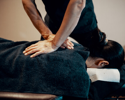 Upper-back adjustment for female patient