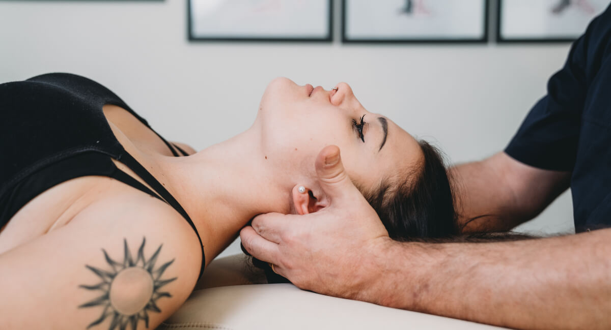 Female patient treated with gentle chiropractic adjustment
