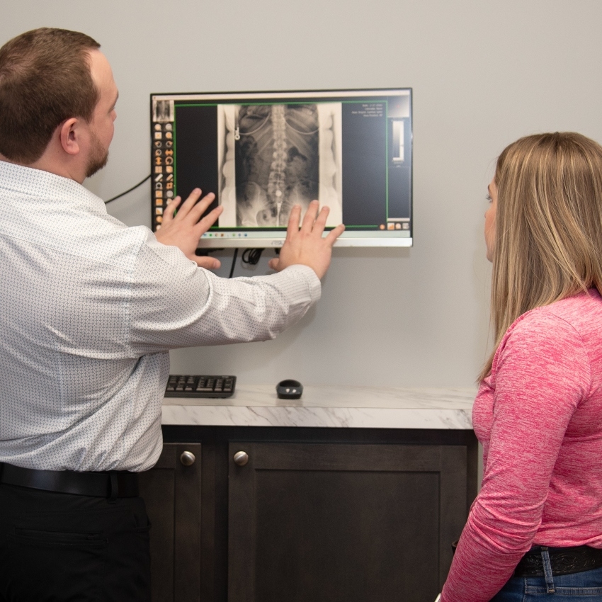 Dr Adam reviewing xrays with patient