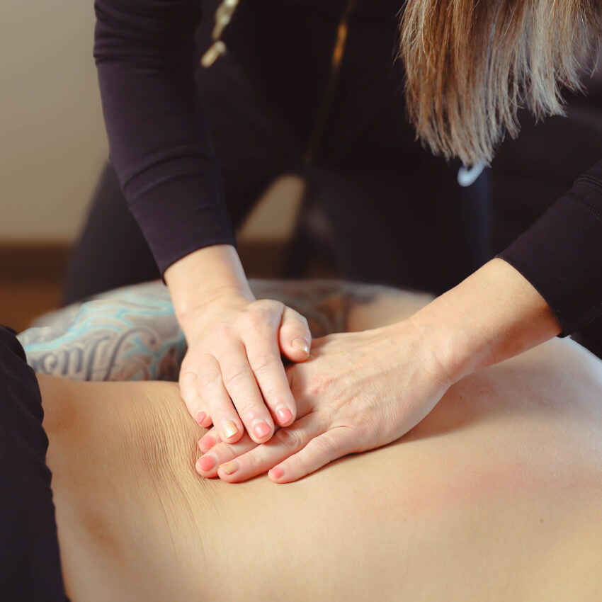 patient having back massaged