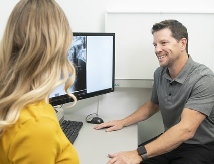 Doctor talking to patient