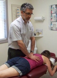 Dr. Goldman adjusting a patient