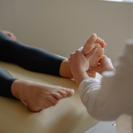 person having foot examined