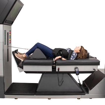 person on decompression table