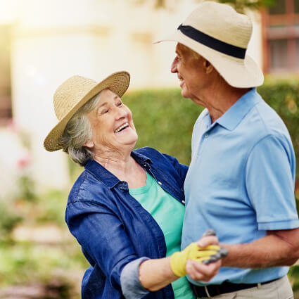 Dancing elderly couple