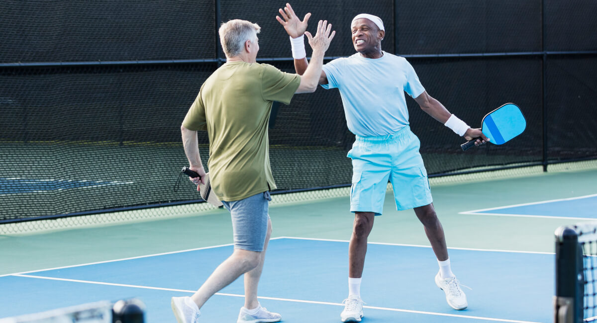 Men playing pickleball