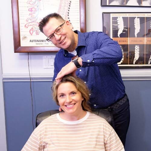 Easton patient receiving a chiropractic neck adjustment