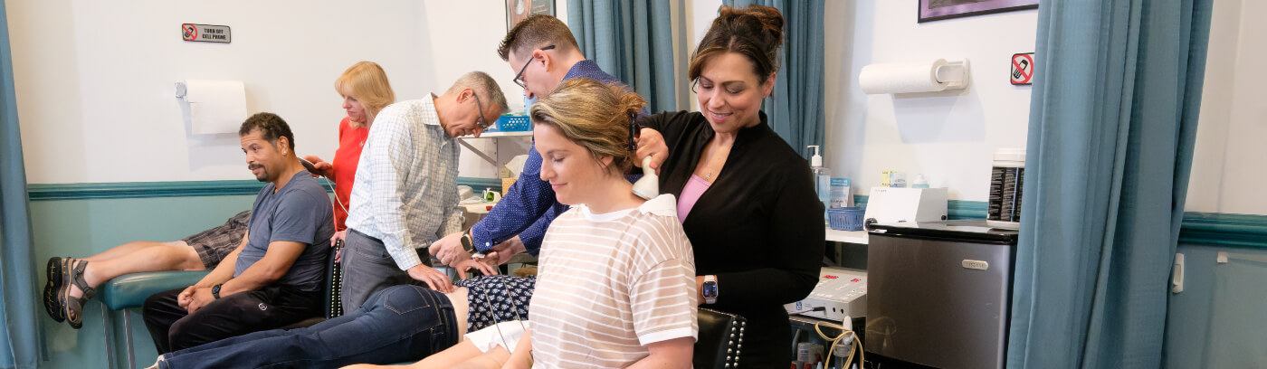 Easton patients receiving treatment at Adelphia Chiropractic Health