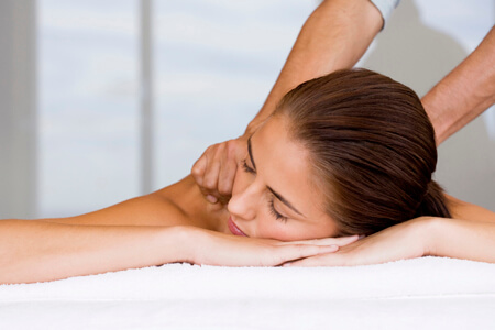 Woman receiving massage therapy