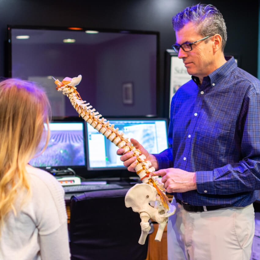 Glasgow chiropractor in a consultation